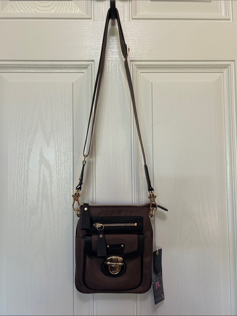 JPK Paris 75 Brown Crossbody Bag with Black Leather Accents and Gold Hardware.